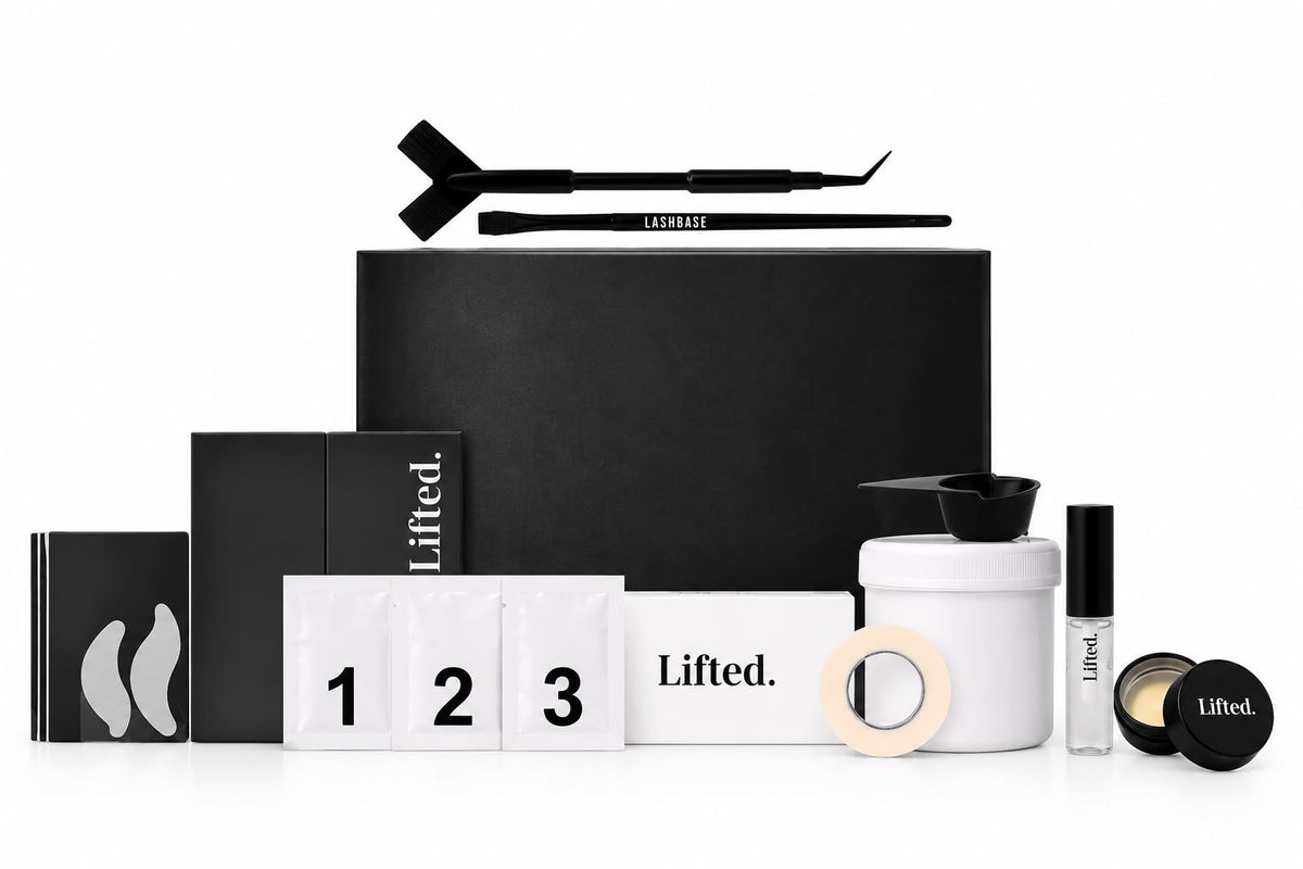 Lifted eyelash lift and tint products including lifting solution and fixing solution steps 1, 2, and 3. Eyelash tape, lash adhesive, lash shields, y comb and a black box featured on a plain white background.